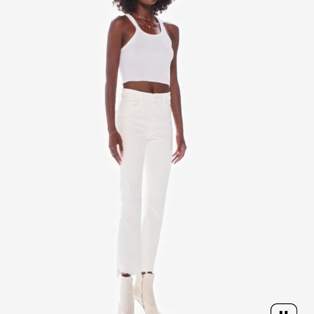 Mother white jeans. Slightly worn. Just a little too tight for the humidity.